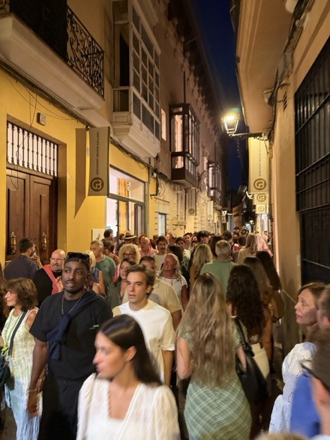 Crowds filling Palma's Old Town streets during Nit de l'Art at night