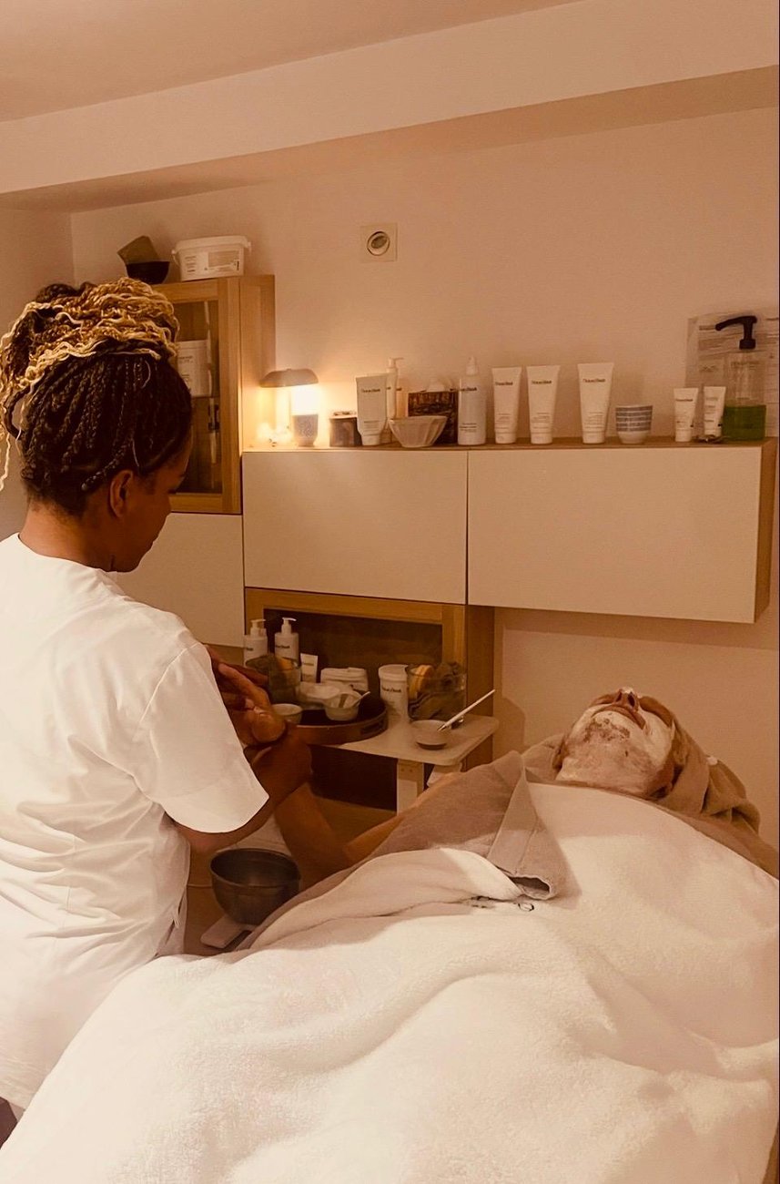 Jas Panesar giving a facial treatment at Sacred Space in Palma, Mallorca