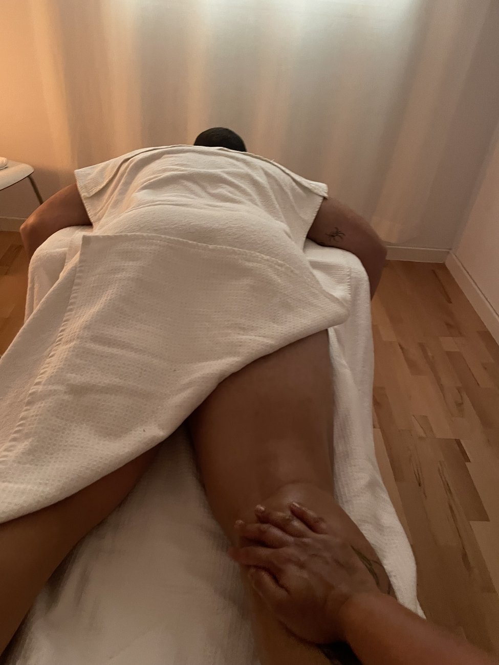 Therapeutic leg massage at Sacred Space in Palma, Mallorca